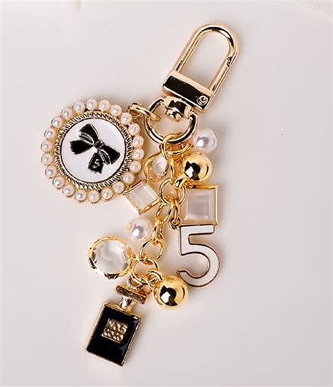 replica chanel key ring|Chanel fluffy keychain.